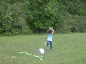 Highlight for Album: 2009-04 Easter-soccer-bailee mowing