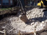 scraping/digging through rock